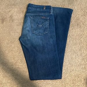 7 for all mankind flare low-rise jeans in a medium wash. Size 25